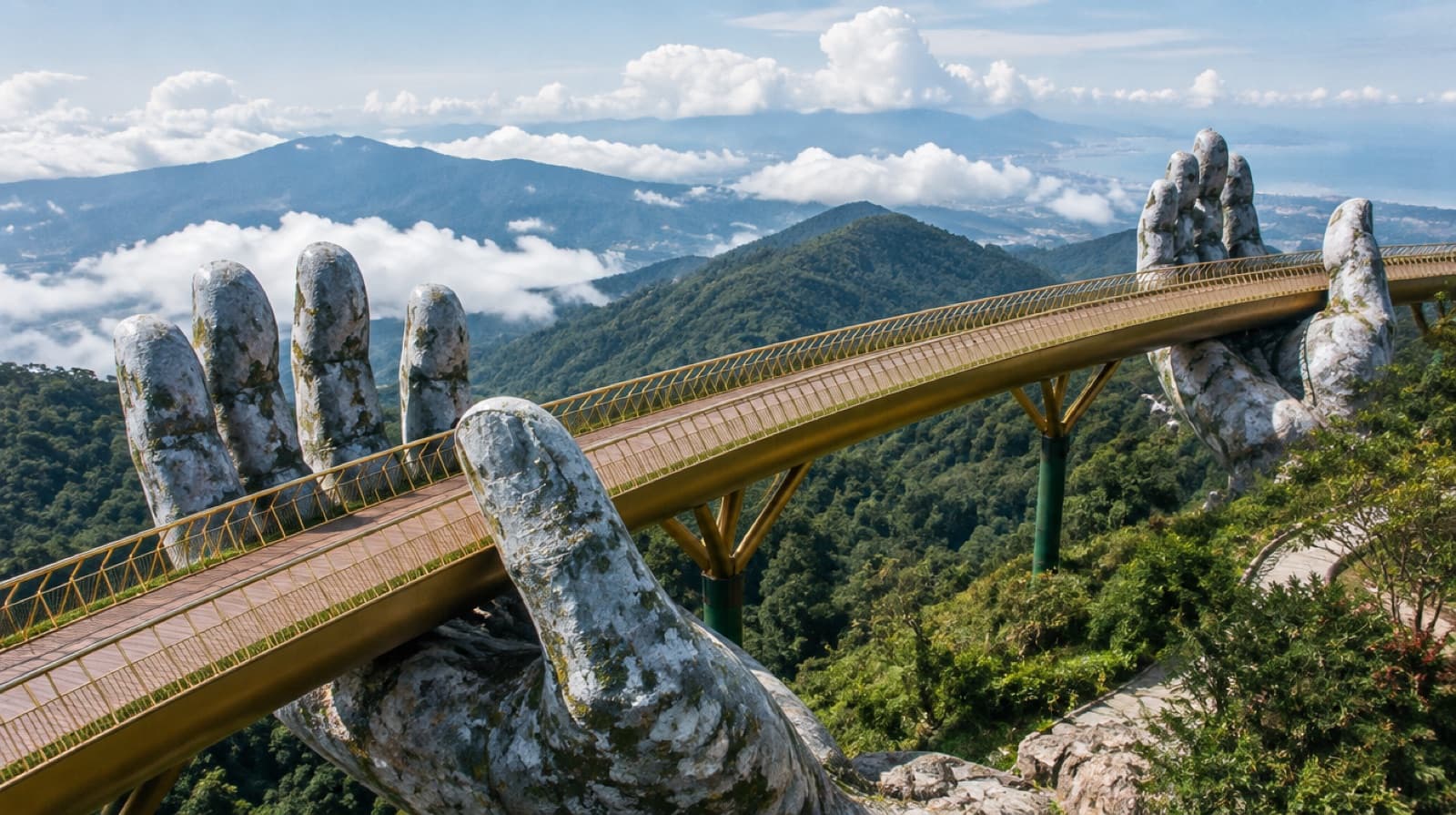 The Golden Bridge held up by two giant stone hands in the Ba Na Hills above Da Nang